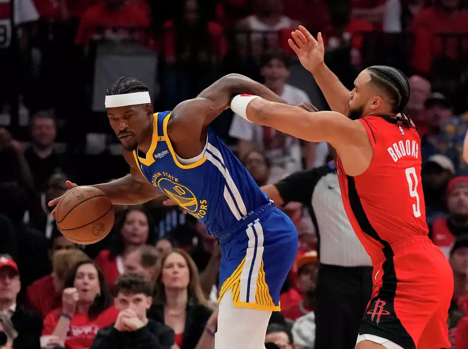 Golden State's Jimmy Butler sustained a pelvis contusion after taking a hard fall on a foul by Amen Thompson late in the first quarter and missed the rest of the Warriors' 109-94 loss to the Houston Rockets on Wednesday night.